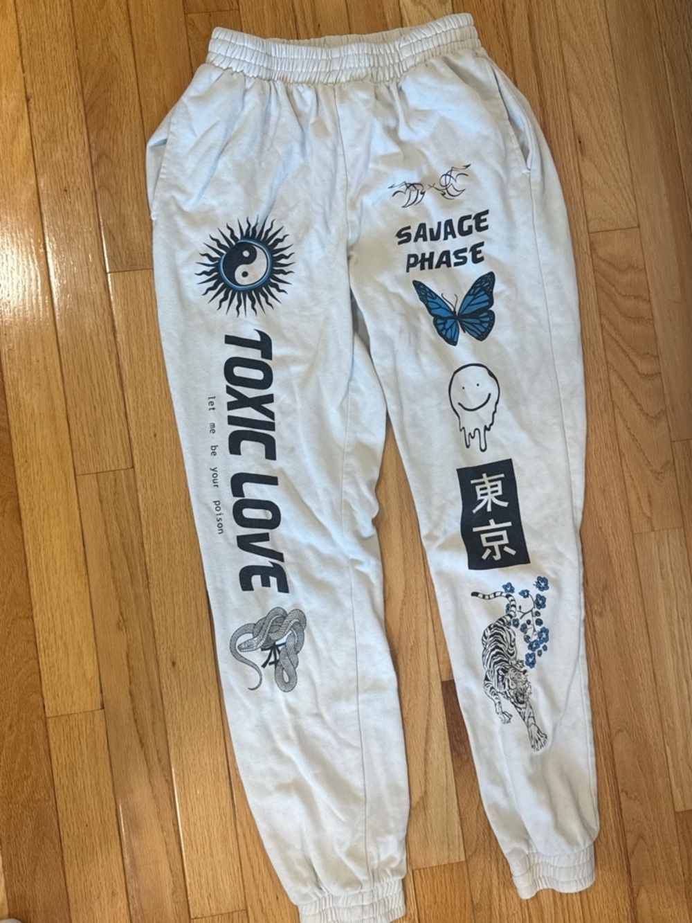 Adika White Sweatpants with Black & Blue Graphic Prints